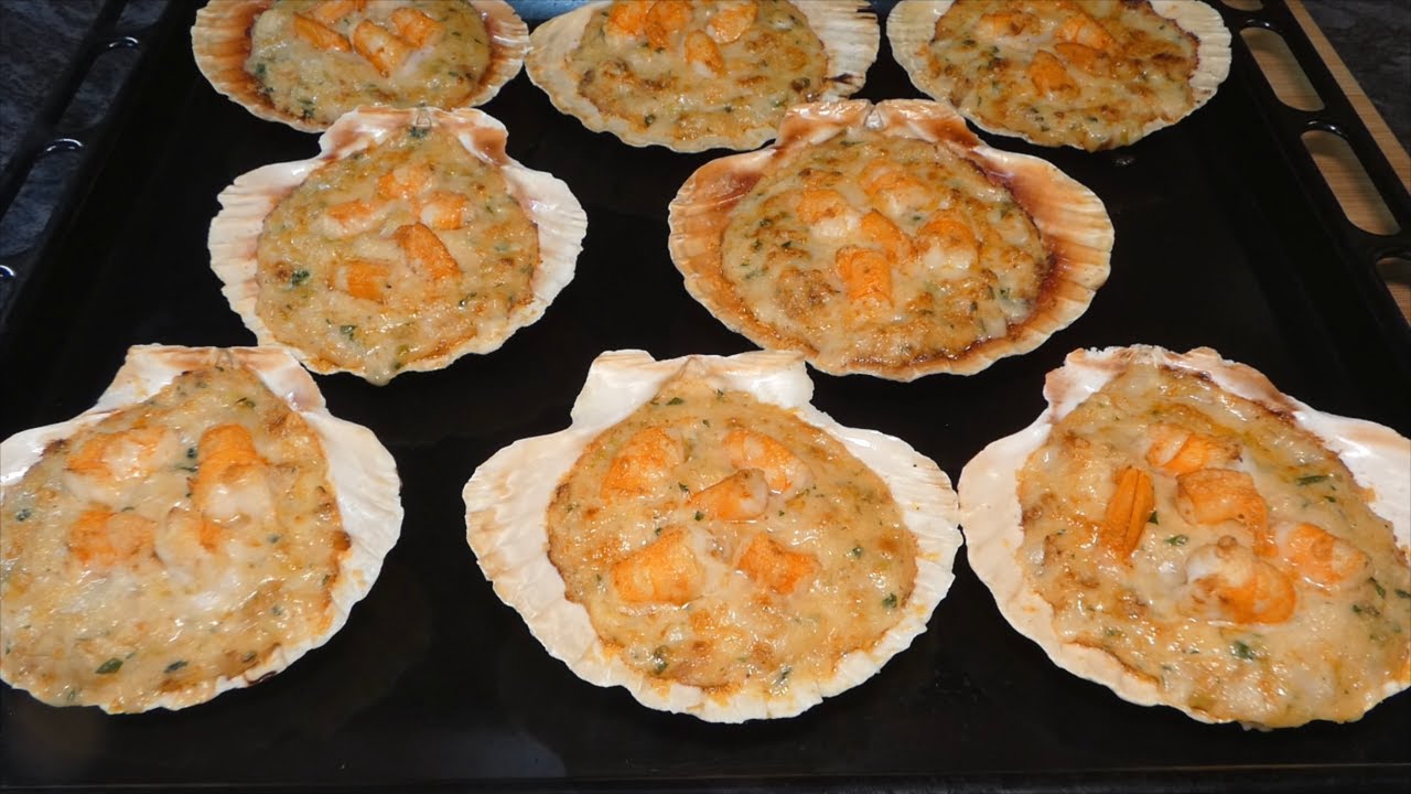 conchas rellenas de merluza y gambas