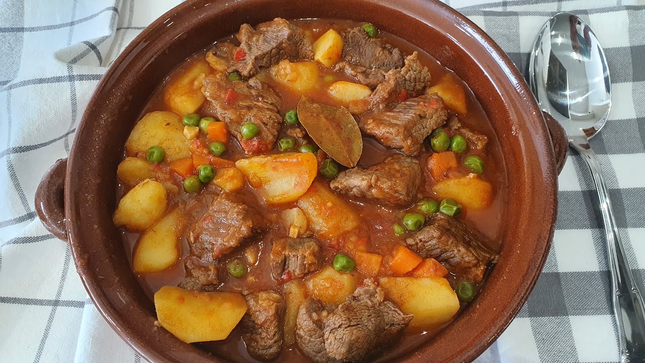 guiso de patatas con guisantes y zanahorias