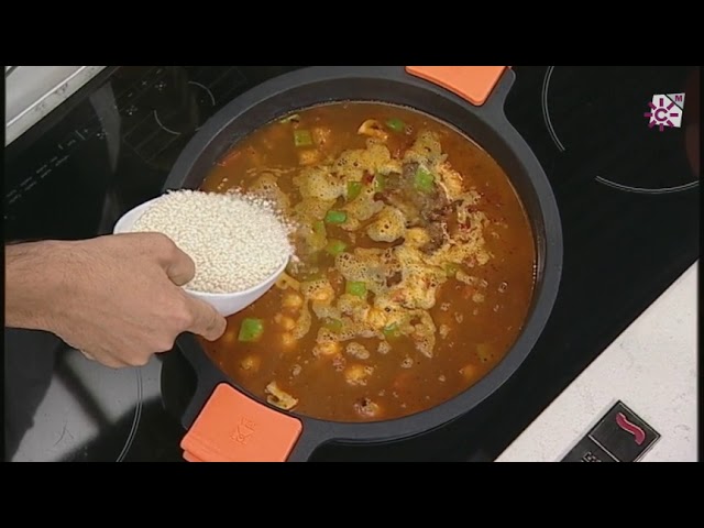 cuanto pesa una racion de paella